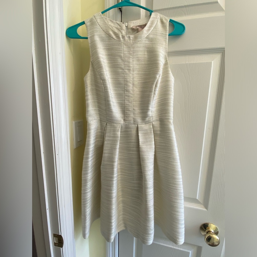 classy ivory dress with gold thread details